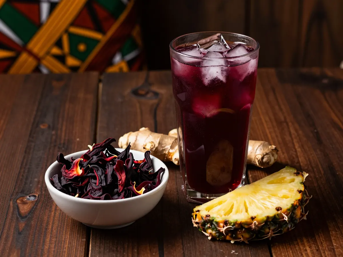 AI-generated photograph: A glass of deep purple hibiscus drink with ice